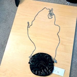 Black coin purse with shoulder strap